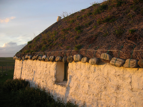 A blackhouse at sunset