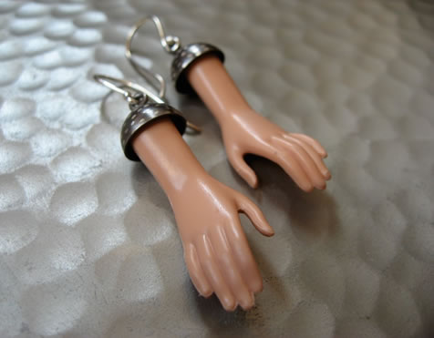 Margaux Lange - Earrings made from Barbie hands