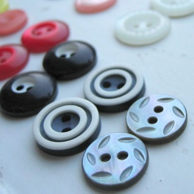Buttons paired up and waiting to be made into earrings