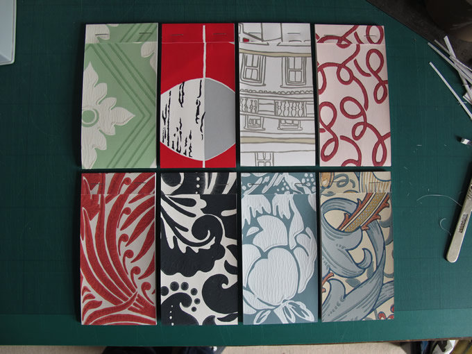 Notebooks with wallpaper sample covers