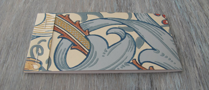 Notebooks with wallpaper sample covers