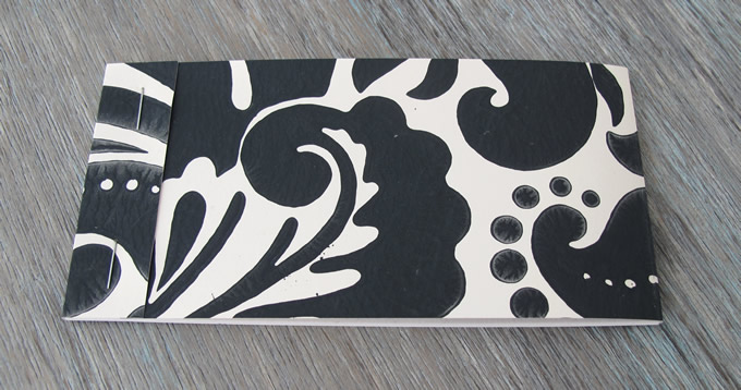 Notebooks with wallpaper sample covers