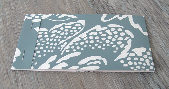 Notebooks with wallpaper sample covers