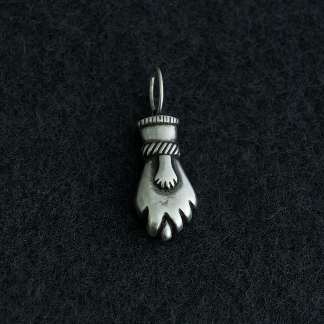 The Mano Figa Charm an ancient talisman cast in sterling silver